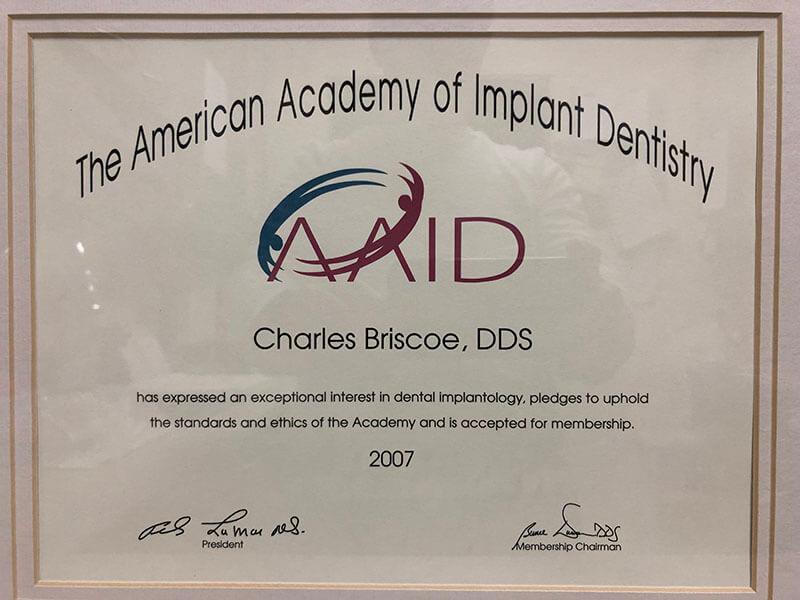 The American Academy of Implant Dentistry award for Dr. Charles Briscoe 2007